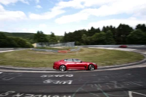 2018-Kia-Stinger-GT-side-in-motion-02.webp