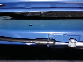 engine bay under fender not painted.webp