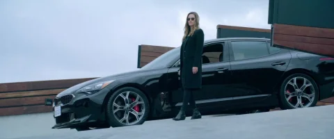 Kia-Stinger-Black-Car-of-Hilary-Swank-as-Detective-Valerie-Quinlan-in-Fatale-2020.webp
