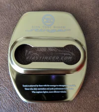 kia-stinger-gold-door-striker-covers-1a.webp