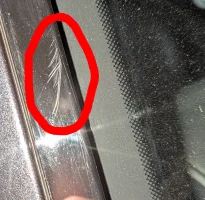 ScratchInClearPlasticTripNextoWindshield.webp