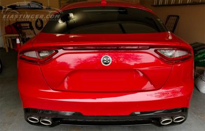 kia stinger e badge on back