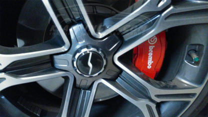 spinning s on wheel