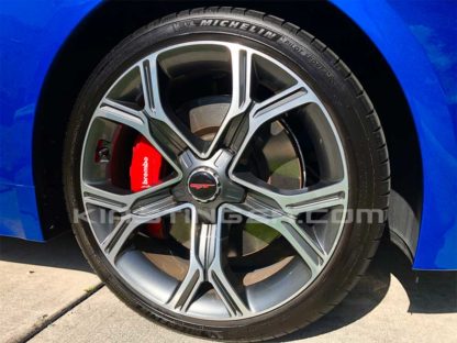 red and white gt wheel cap overlay for kia stinger