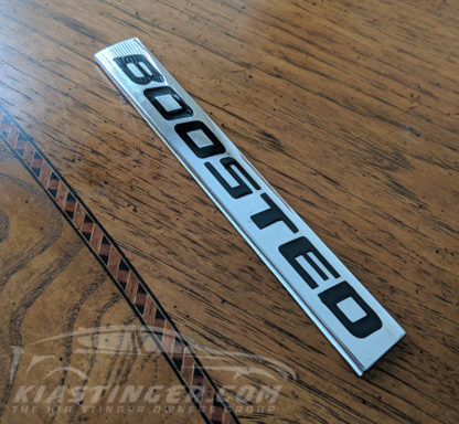 kia stinger boosted badge
