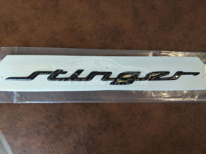 kia stinger carbon fiber rear hatch emblem