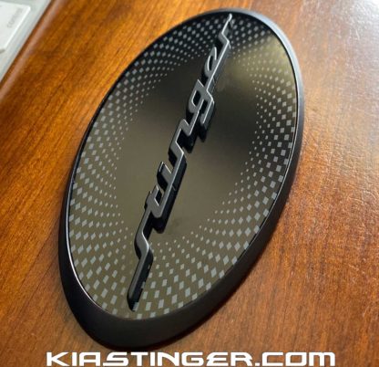 oval stinger badge matte black checkered center